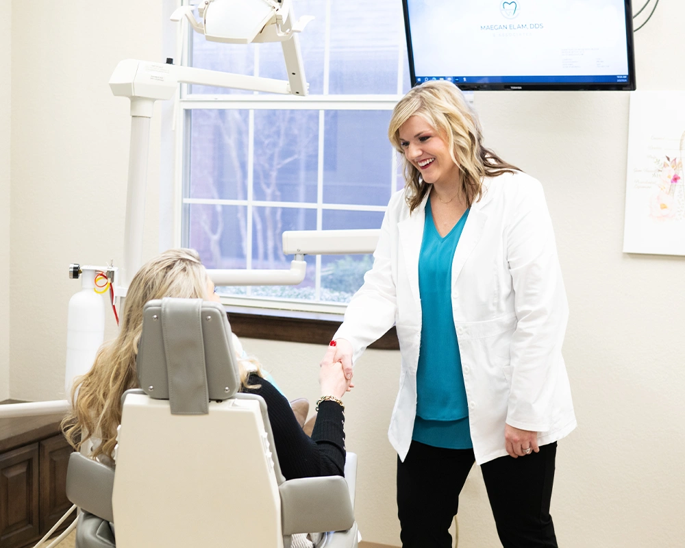 Dr. Maegan Elam warmly greets a new patient