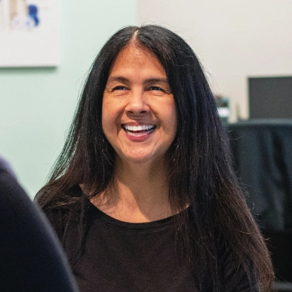 Smiling woman receiving personalized concierge dental service at Bedford dental office