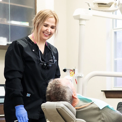 providing a full suite of dental treatments to a patient in Bedford, TX office