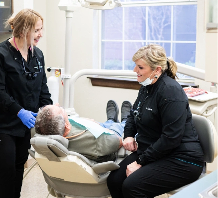 Trusted dentist in Bedford TX providing patient care during dental visit